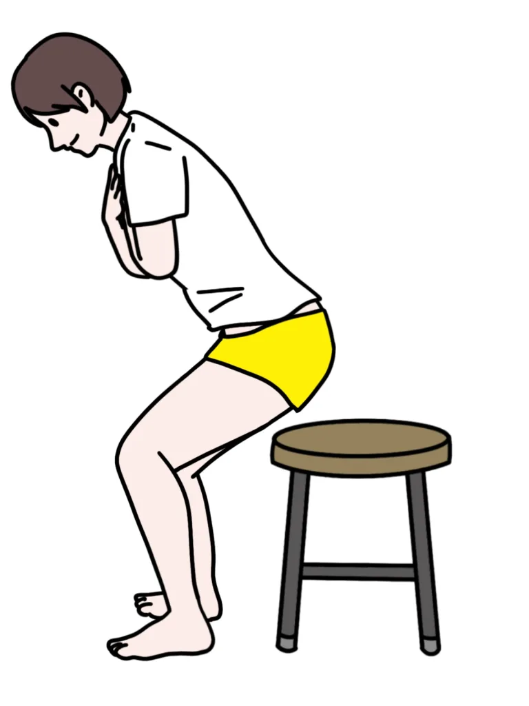 ボックススクワットをしてる女性