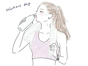 筋トレのインターバル中に水を飲む女性