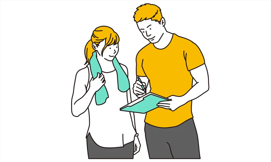 ジムトレーナーと女性