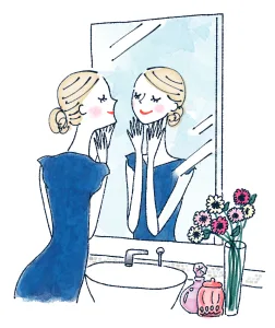 鏡を見る美しい女性