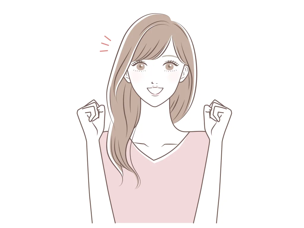 ガッツポーズする女性